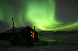 northern lights and cabin , image by Per Jessen